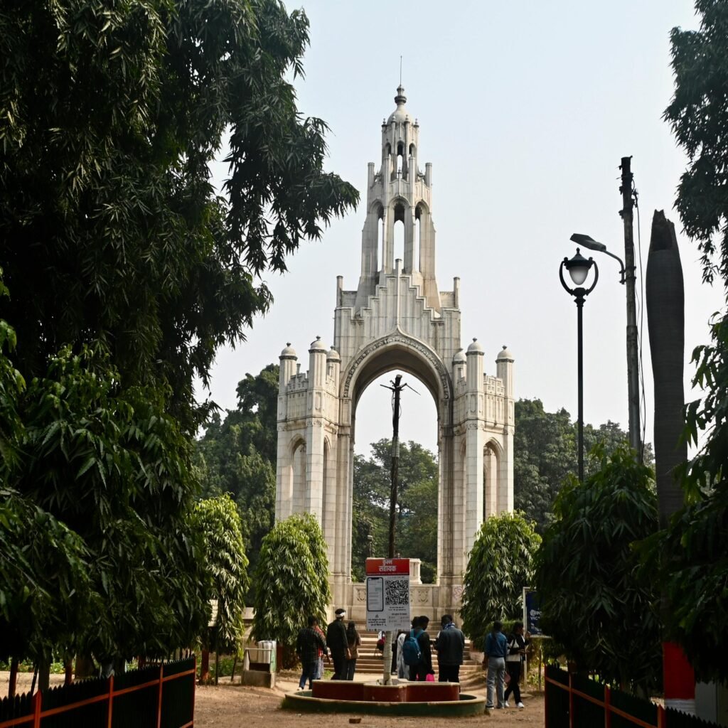 Photograph of the iconic entrance archway at Allahabad University in Prayagraj, India.